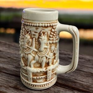 CERAMIC BROWN AND WHITE STEIN #1315 EMBOSSED WINTER SCENE WITH CLYDESDALE HORSES